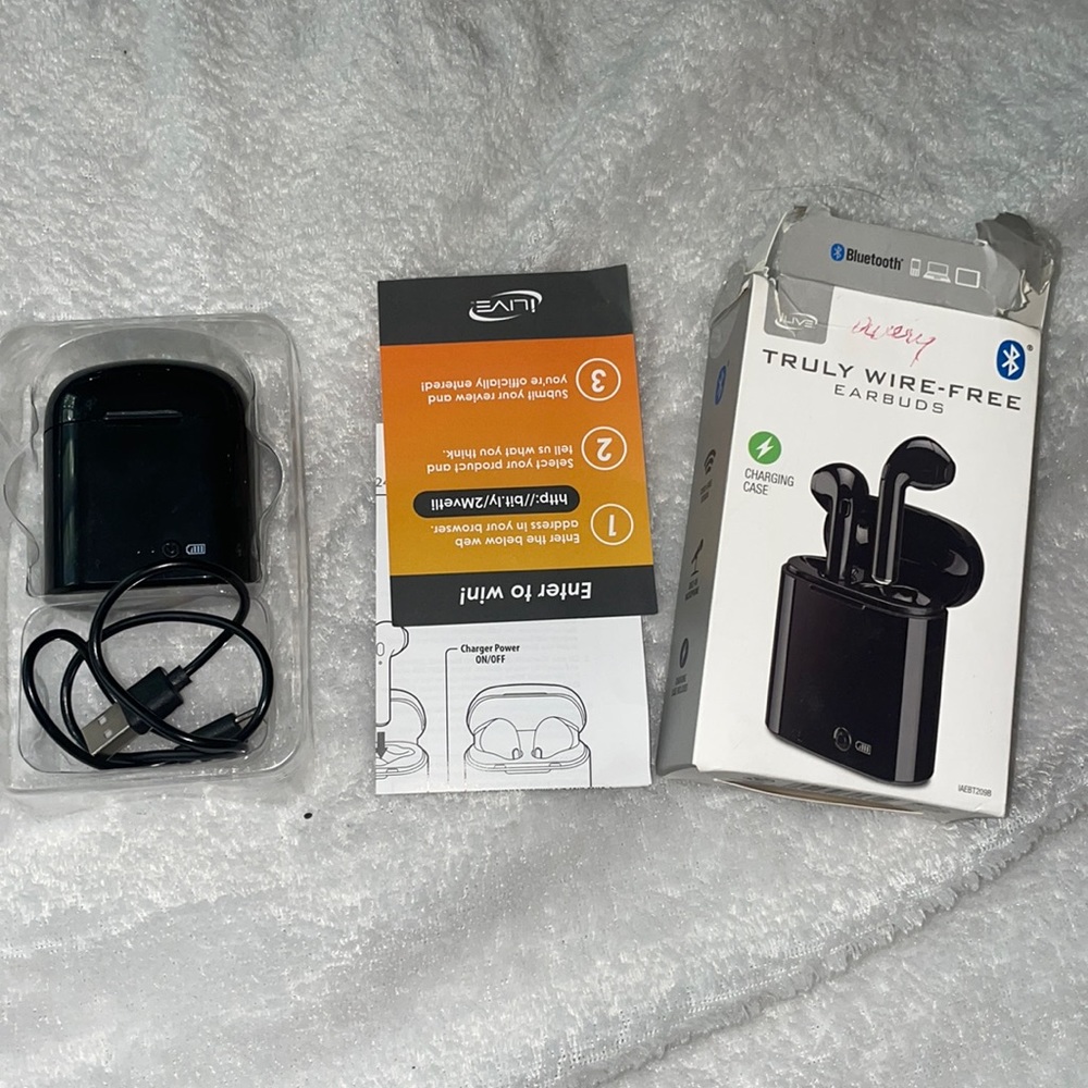 Bluetooth earbuds. Never worn with box and instructions